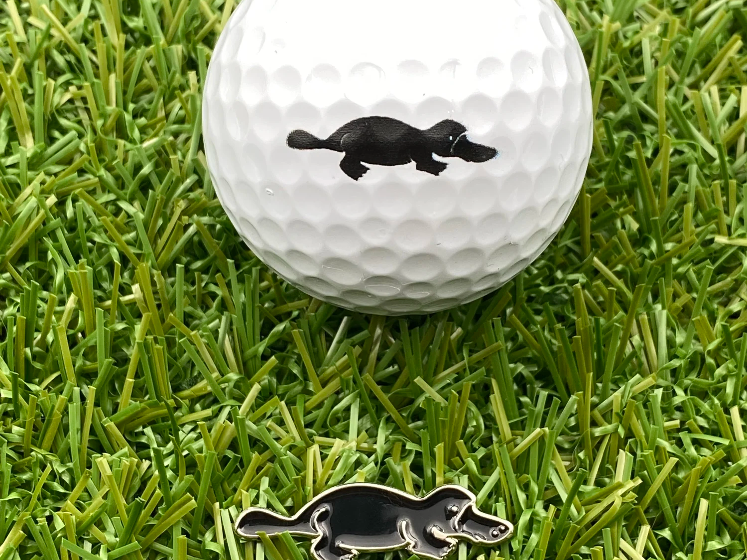 Black silhouette Platypus magnetic golf ball marker