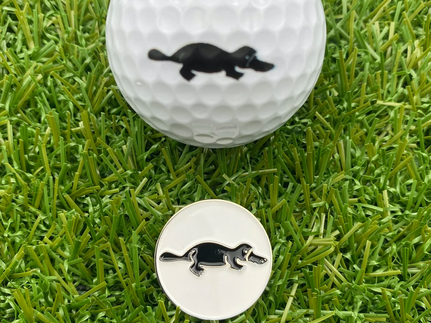 White circle Platypus magnetic golf ball marker